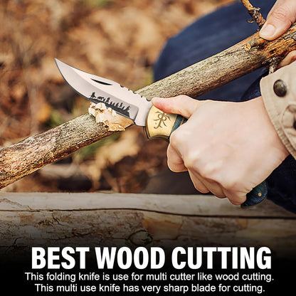 Lord of the Rings folding pocket knife demonstrating outdoor wood cutting with ergonomic blue Pakka wood handle