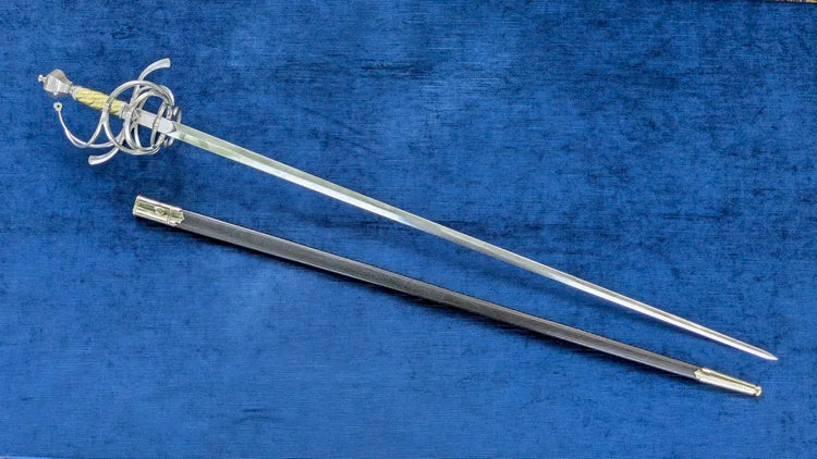 A long sword with a silver-colored metal guard and blade, displayed diagonally next to its dark sheath on a textured blue background.
