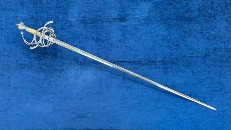 A medieval-style sword with a silver steel blade, a gold-colored grip, and a silver wire guard, displayed diagonally on a textured blue background.