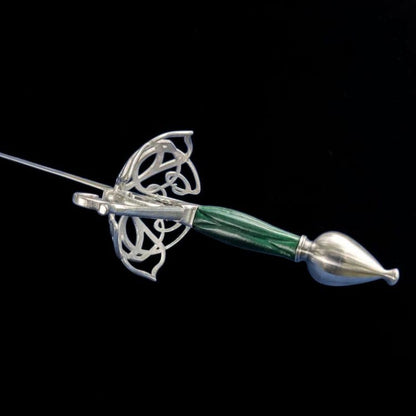 A decorative fencing or dagger-style sword with a polished silver-colored metal guard and pommel, featuring a green marbled handle, set against a solid black background.