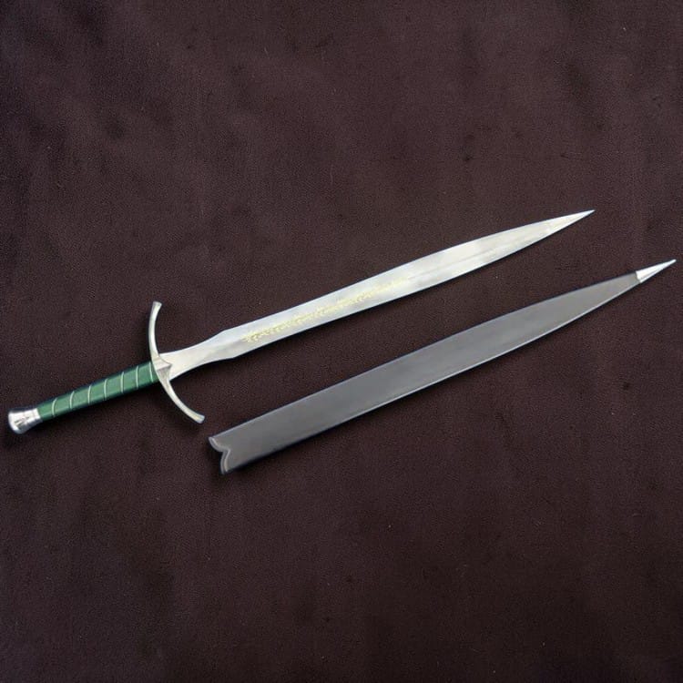 A medieval-style sword with a silver blade, curved silver crossguard, and green wrapped handle, shown alongside its matching silver sheath on a dark brown textured background.