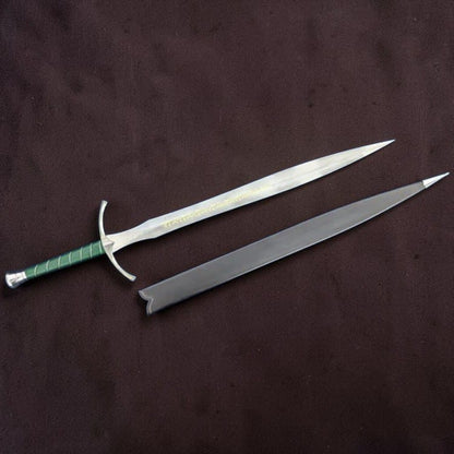 A medieval-style sword with a silver blade, curved silver crossguard, and green wrapped handle, shown alongside its matching silver sheath on a dark brown textured background.