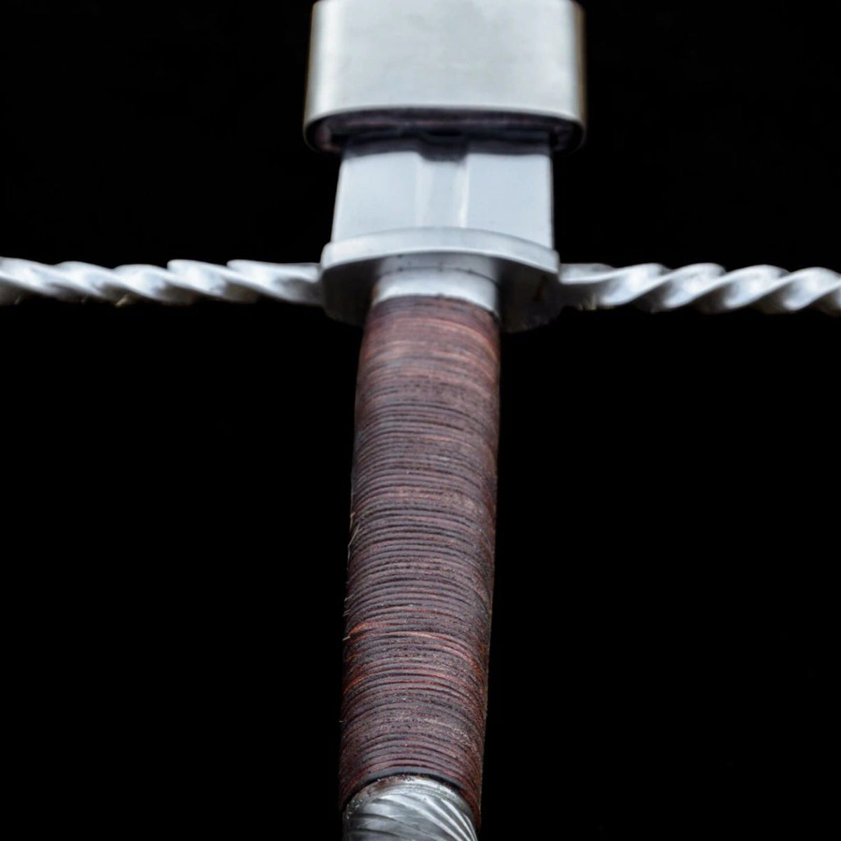 Leather Wrapped Grip and Steel Pommel Detail of Hand and a Half Oakeshott Type XVa Medieval Sword