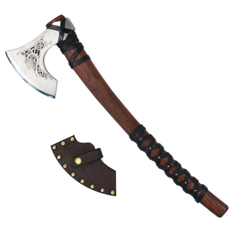 Decorative axe with wooden handle and metal head, accompanied by a sheath on a white background