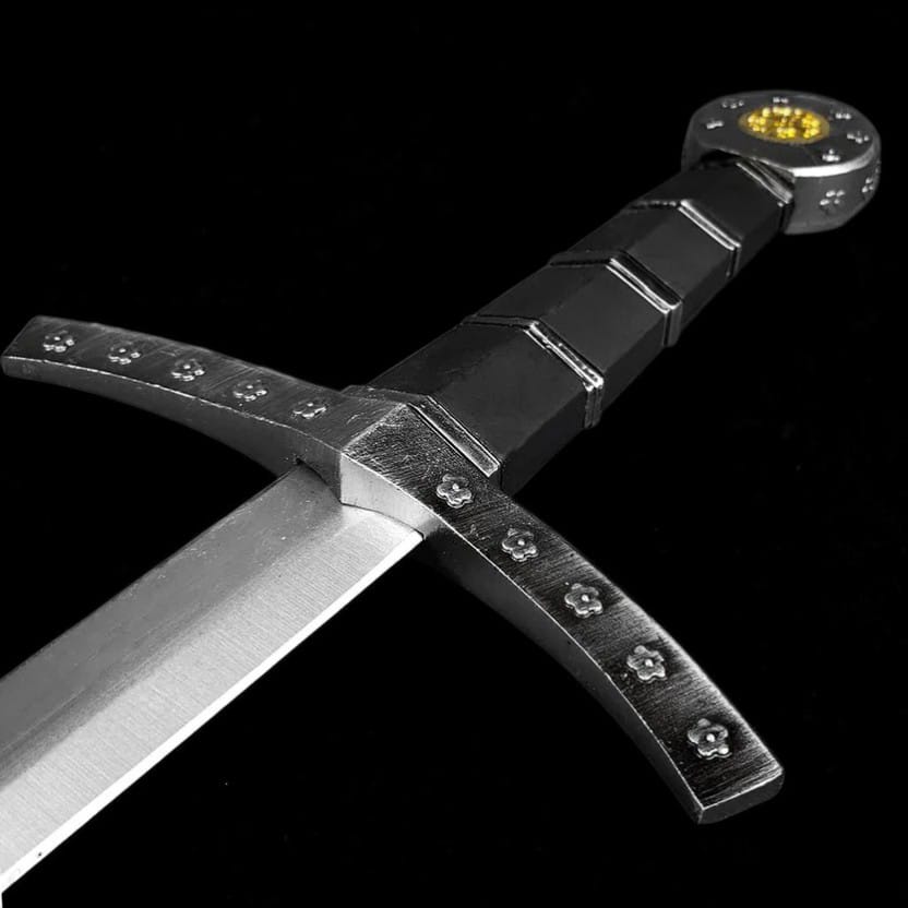 Close-up of the Knights Templar medieval sword cross guard, handle, and decorative details