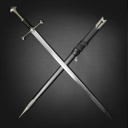 Full view of a medieval sword with polished steel blade, detailed handle, crossguard and black scabbard