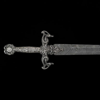 Close-up of the Renaissance Long Sword featuring an ornate medieval style hilt and Damascus pattern steel blade.