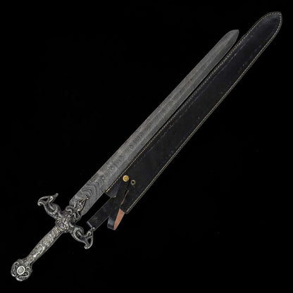 Renaissance Long Sword displayed with black leather scabbard, Damascus pattern blade and decorative medieval style handle.