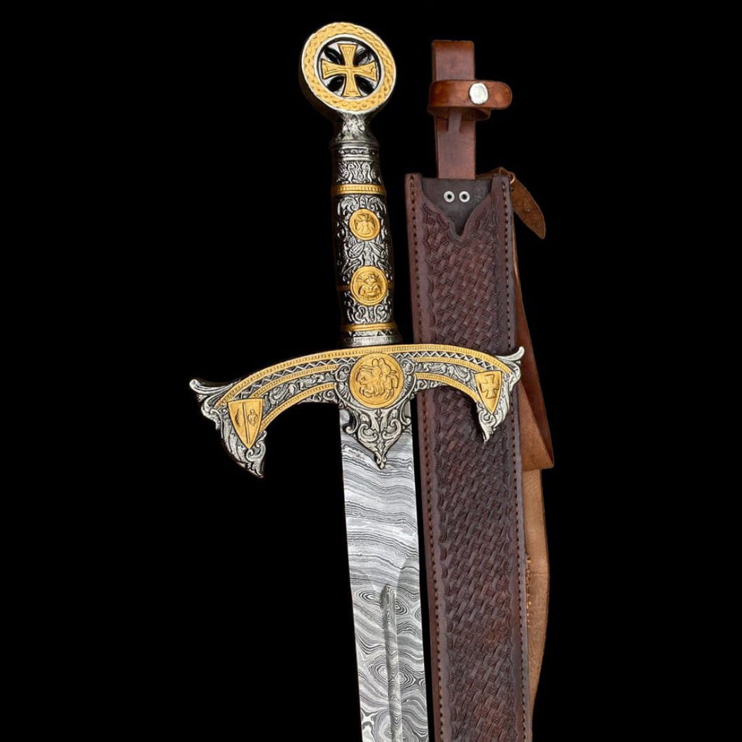 Handmade Damascus steel Templar sword displayed with a brown leather sheath featuring an engraved metal handle and decorative crossguard.
